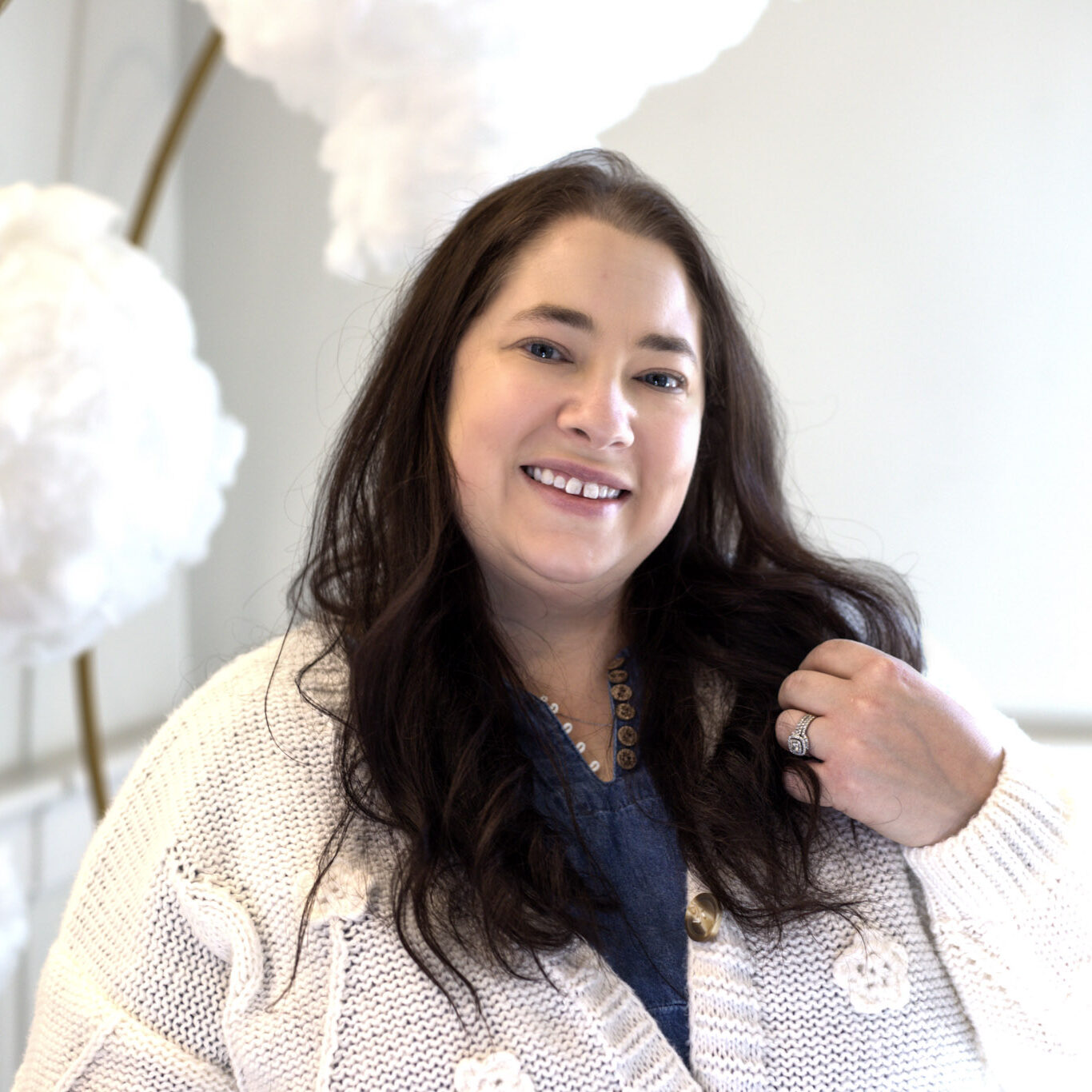 Katie Picking Daisies Media Engagement Manager